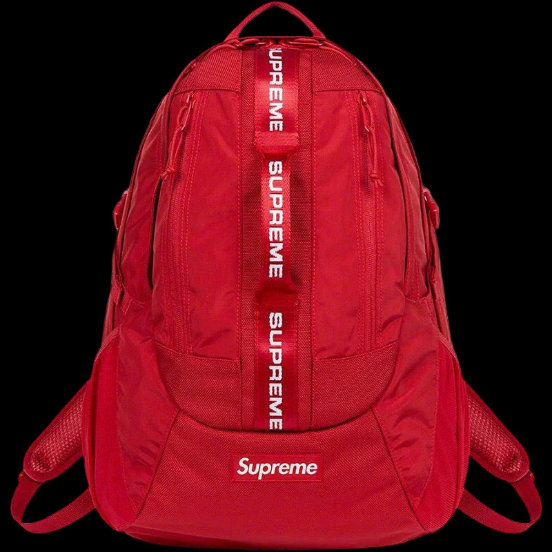 Red Supreme backpack with brand logo on a white background